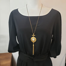 Load image into Gallery viewer, Goldtone Shield Medallion Tassel Necklace - Faux Pearl
