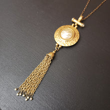 Load image into Gallery viewer, Goldtone Shield Medallion Tassel Necklace - Faux Pearl

